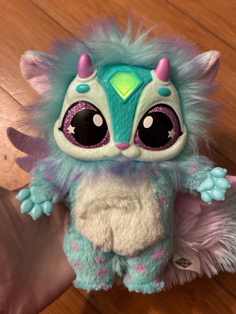 Magic mixies Blue and pink plush toy with glittery eyes and pink horns